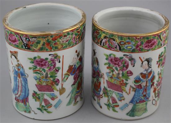 A pair of Chinese Canton-decorated famille rose brush pots, Daoguang period, 16cm, one cracked